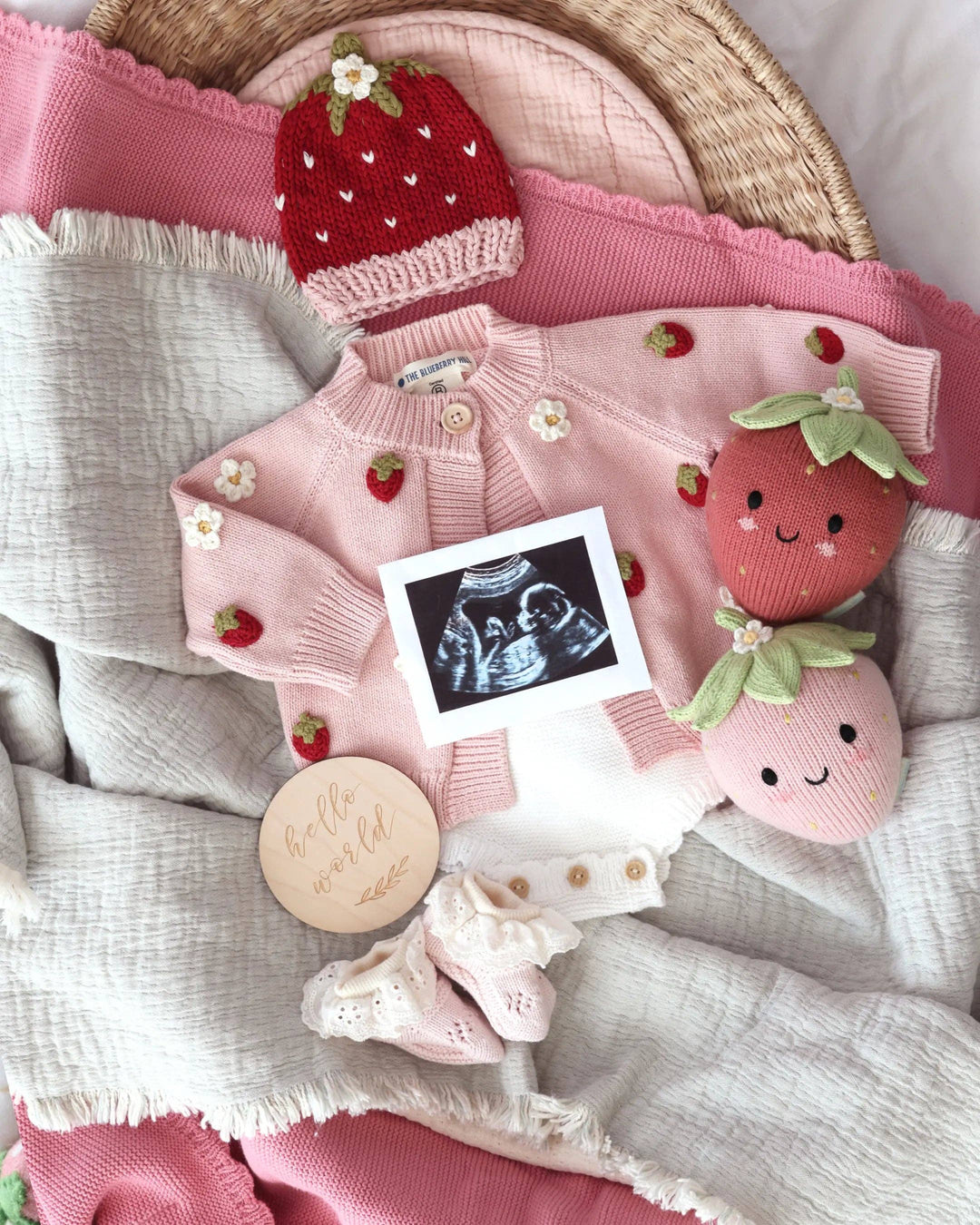 Cuddle + Kind Baby Strawberry 7 inch hand-knit strawberry plush toy and baby shower gift