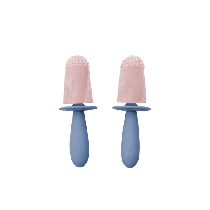 Toddlers can explore textures with the Indigo EZPZ Happy Pops, an easy-to-hold silicone baby feeding set