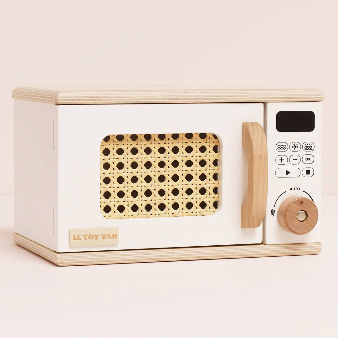 Le Toy Van Wooden Microwave brings imaginative play to life as a Montessori toy for kids.
