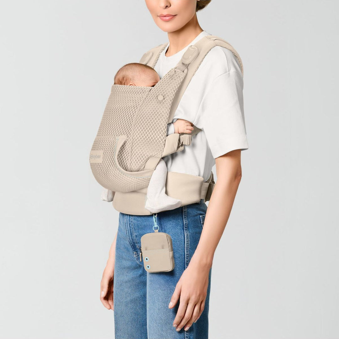 Cybex Laya Carrier Almond Beige angled view – showing lumbar support waistbelt and breathable fabric
