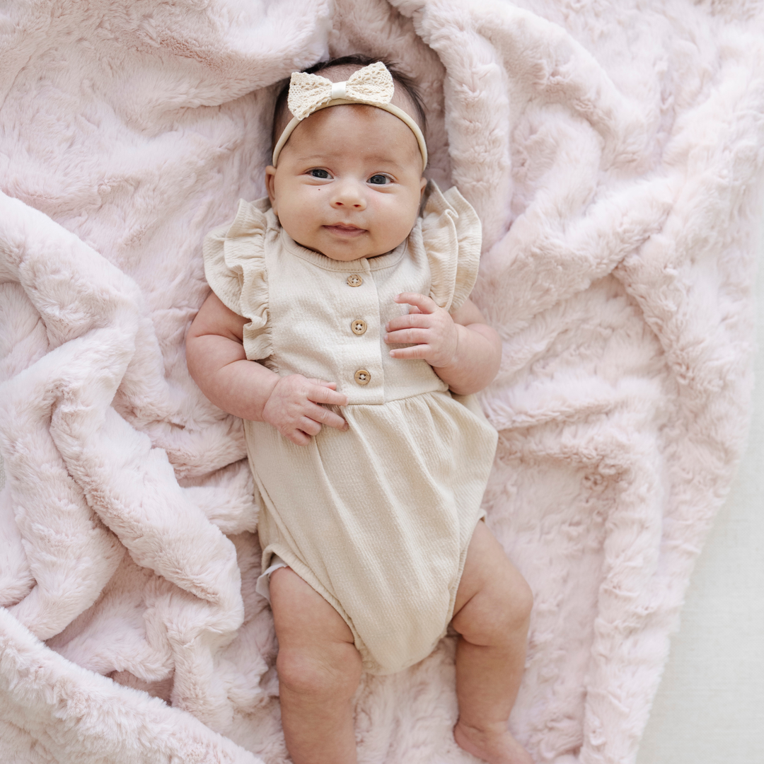 Saranoni Dream Receiving Blanket in Blush ensures warmth and comfort, one of the best baby blankets for newborns.