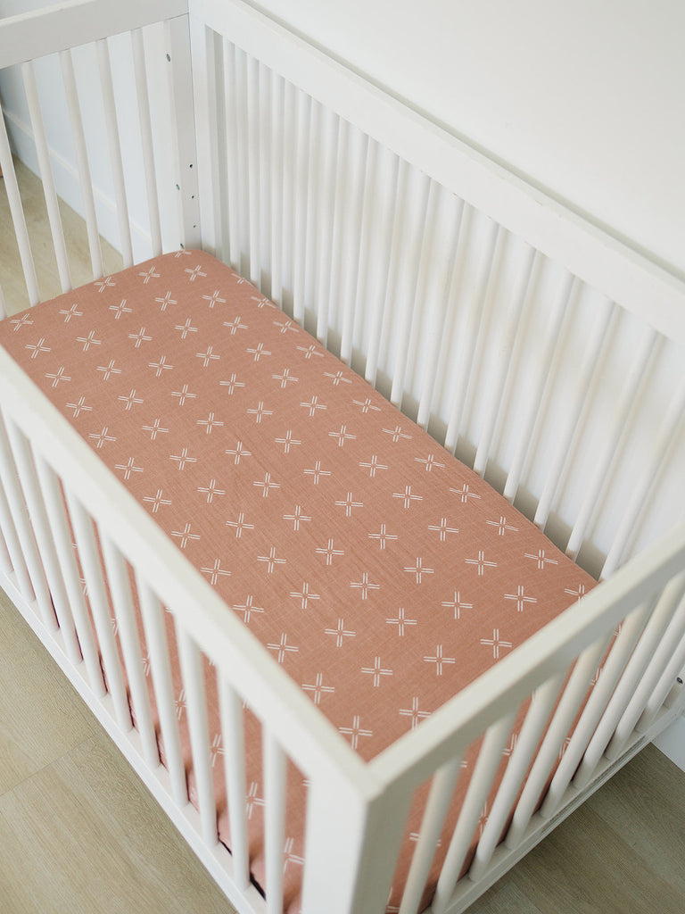 Mebie Baby Just Peachy Muslin Crib Sheet in peach, ideal for crib mattress sheets