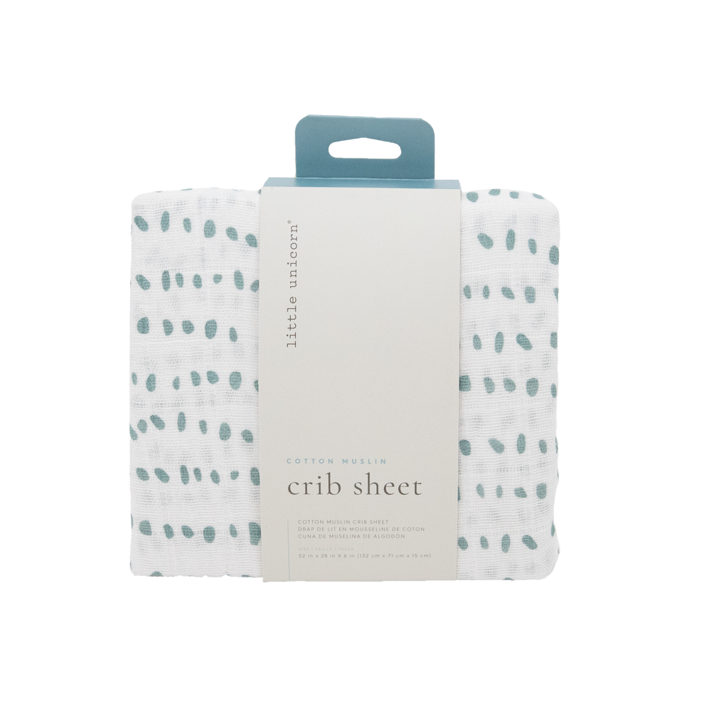 Minimalist and cozy, the Little Unicorn Cotton Muslin Crib Sheet - Stone Stripe offers premium organic cotton crib sheets for nurseries.