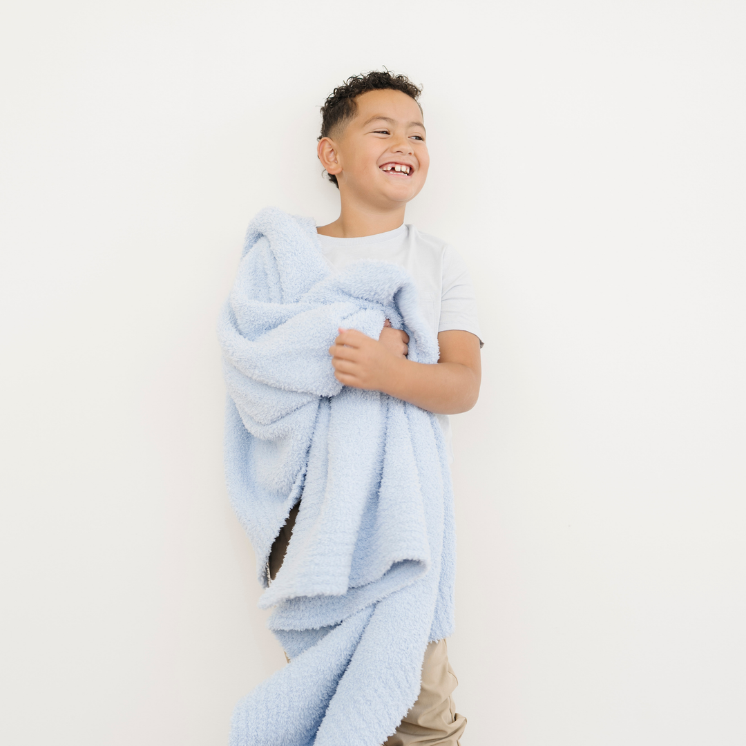 Cozy Light Blue BAMBONI¨ Toddler Blanket by Saranoni, designed for daily snuggles and as a best toddler blanket.