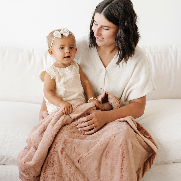 Soft Rosy Lush Receiving Blanket from Saranoni ensures warmth, ideal among receiving blankets.