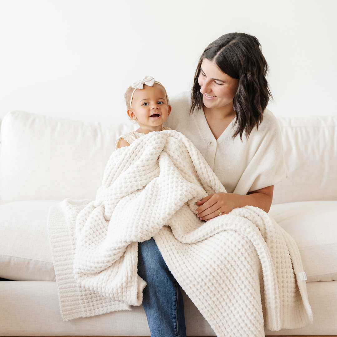Swan Saranoni Waffle Knit Receiving Blanket serves as a comfy toddler blanket for naps or lounging.