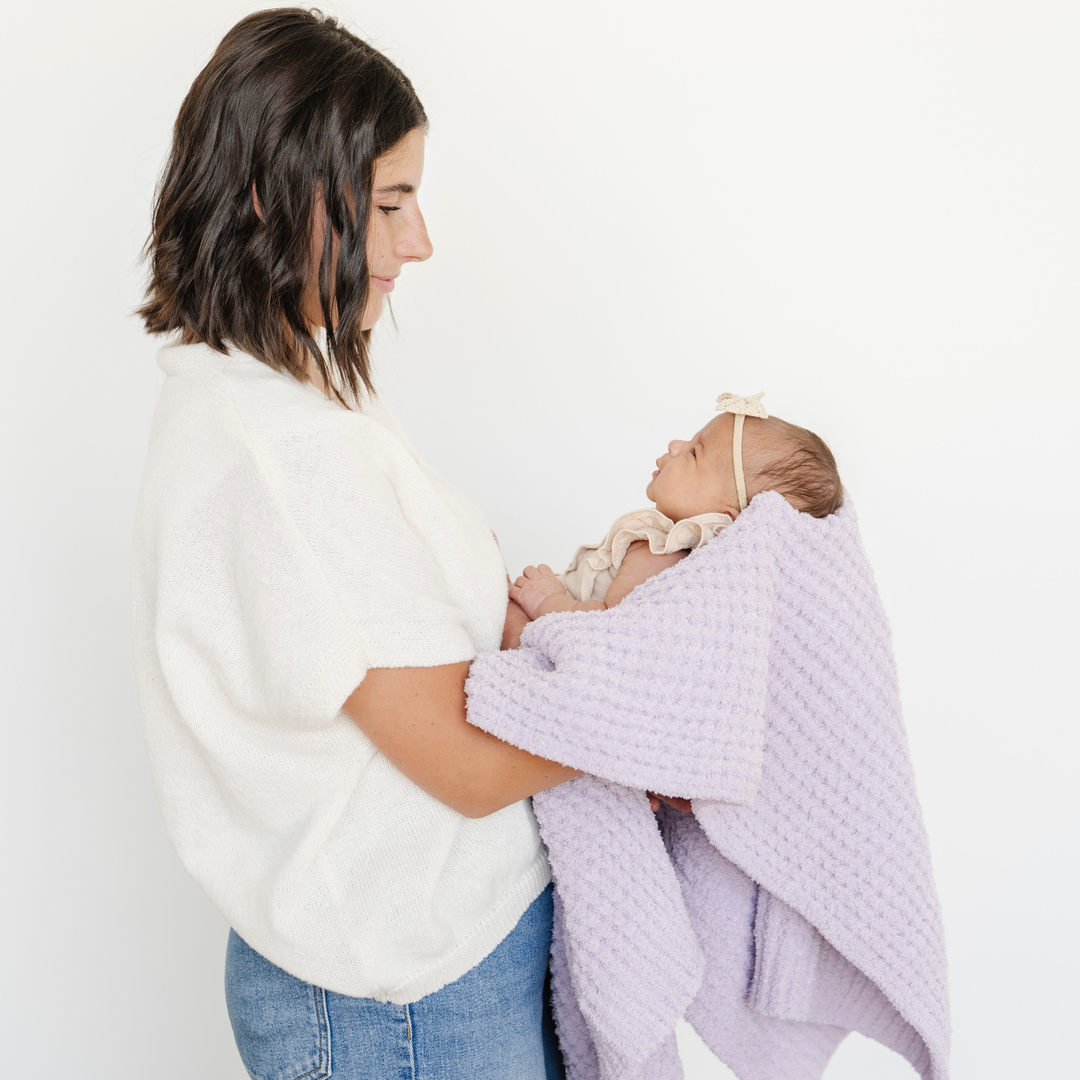 Saranoni Waffle Knit Receiving Blanket in Wisteria is a soft baby blanket perfect for swaddling newborns.