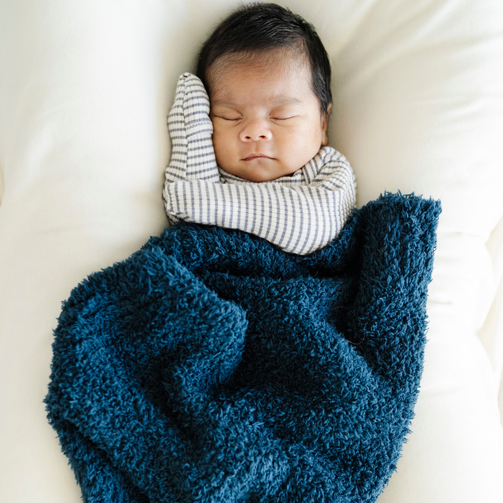 Experience cloud-like softness with the Saranoni Bamboni¨ Receiving Blanket in Nautical Blue, a top baby boy blanket.