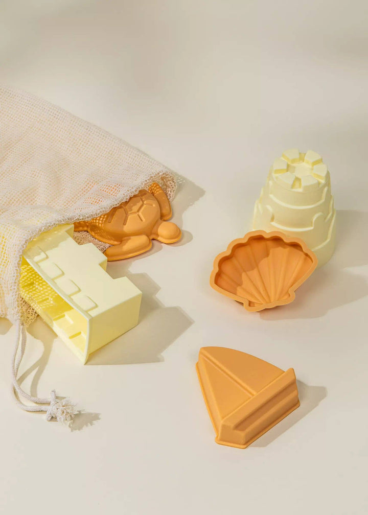 Playful outdoor adventures with Coco Village 5 Silicone Sand Moulds in Multicolor, ideal for baby toys fun.