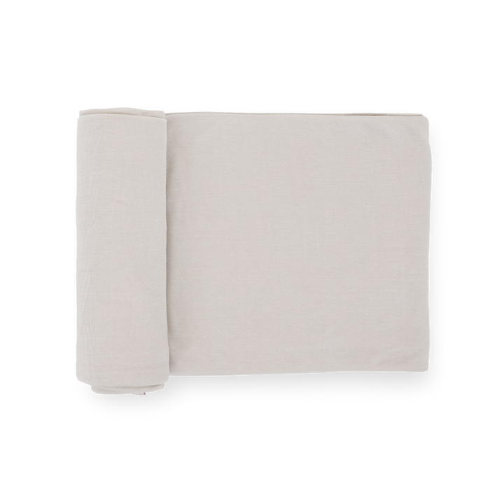 Little Unicorn Stretch Knit Swaddle Blanket in Pebble, soft baby blanket for newborns.