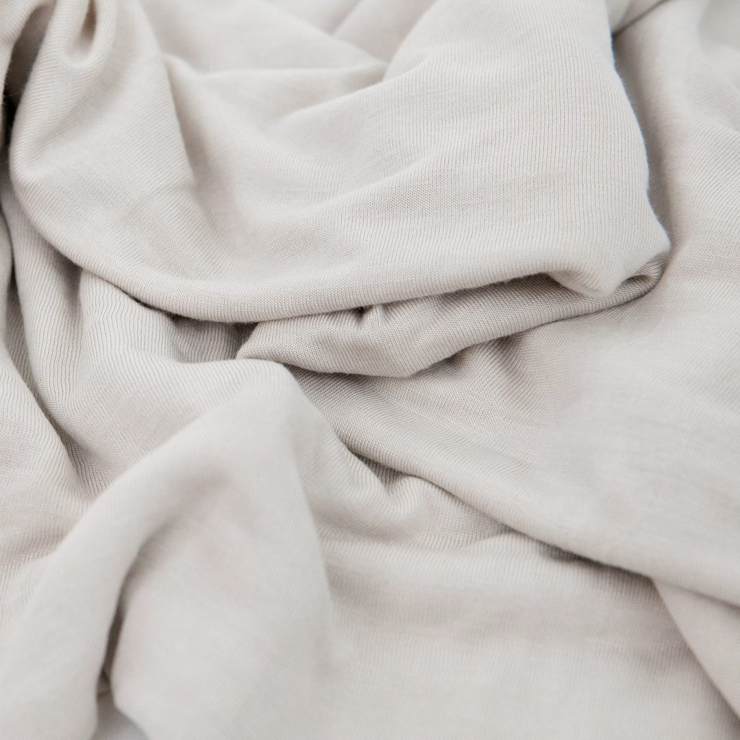 Wrap your baby in Little Unicorn Grey Cross Stretch Knit Swaddle Blanket 2 Pack, swaddling muslin blanket