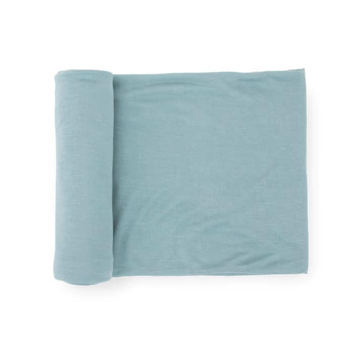 Little Unicorn Stretch Knit Swaddle Blanket in Harbor, soft baby blanket for newborns.