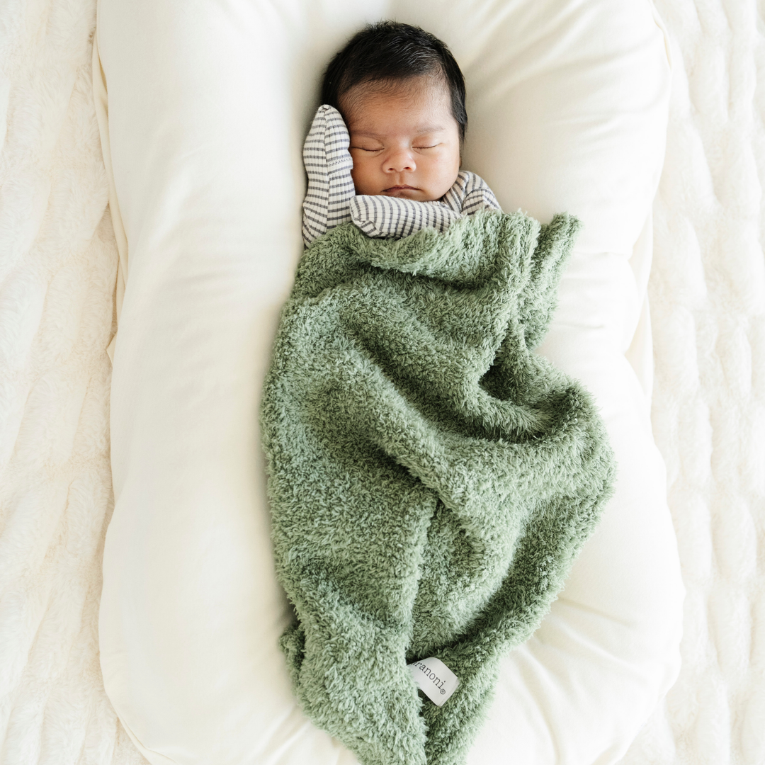 SaranoniÕs BAMBONI¨ Mini Blanket in Olive surrounds your baby boy in warmth, a timeless and gentle baby boy blanket.
