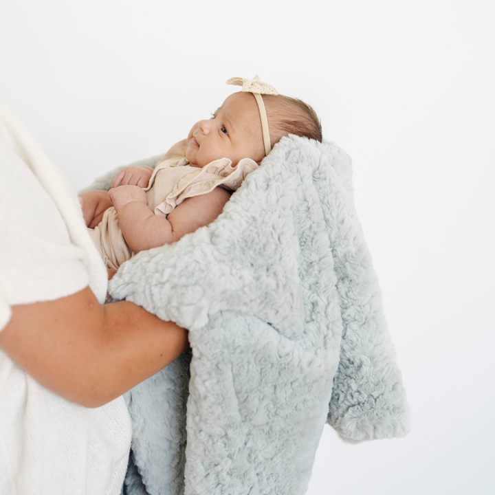 Plush comfort meets timeless design in the Saranoni Dream Receiving Blanket in Sweet Mint, a baby receiving blanket favorite.