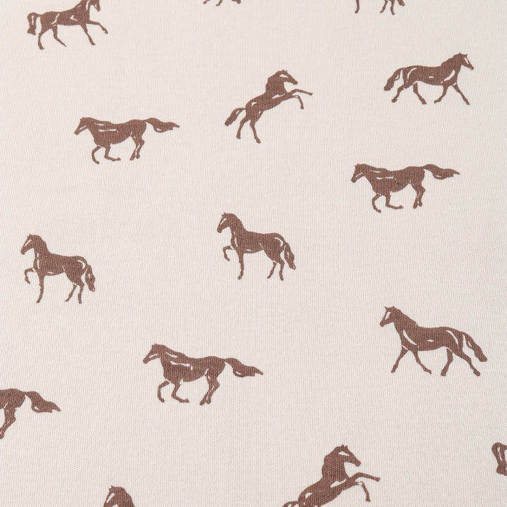 MakeMake Organics 2-Way Zip Romper Horses lifestyle - playful graphic organic cotton baby outfit