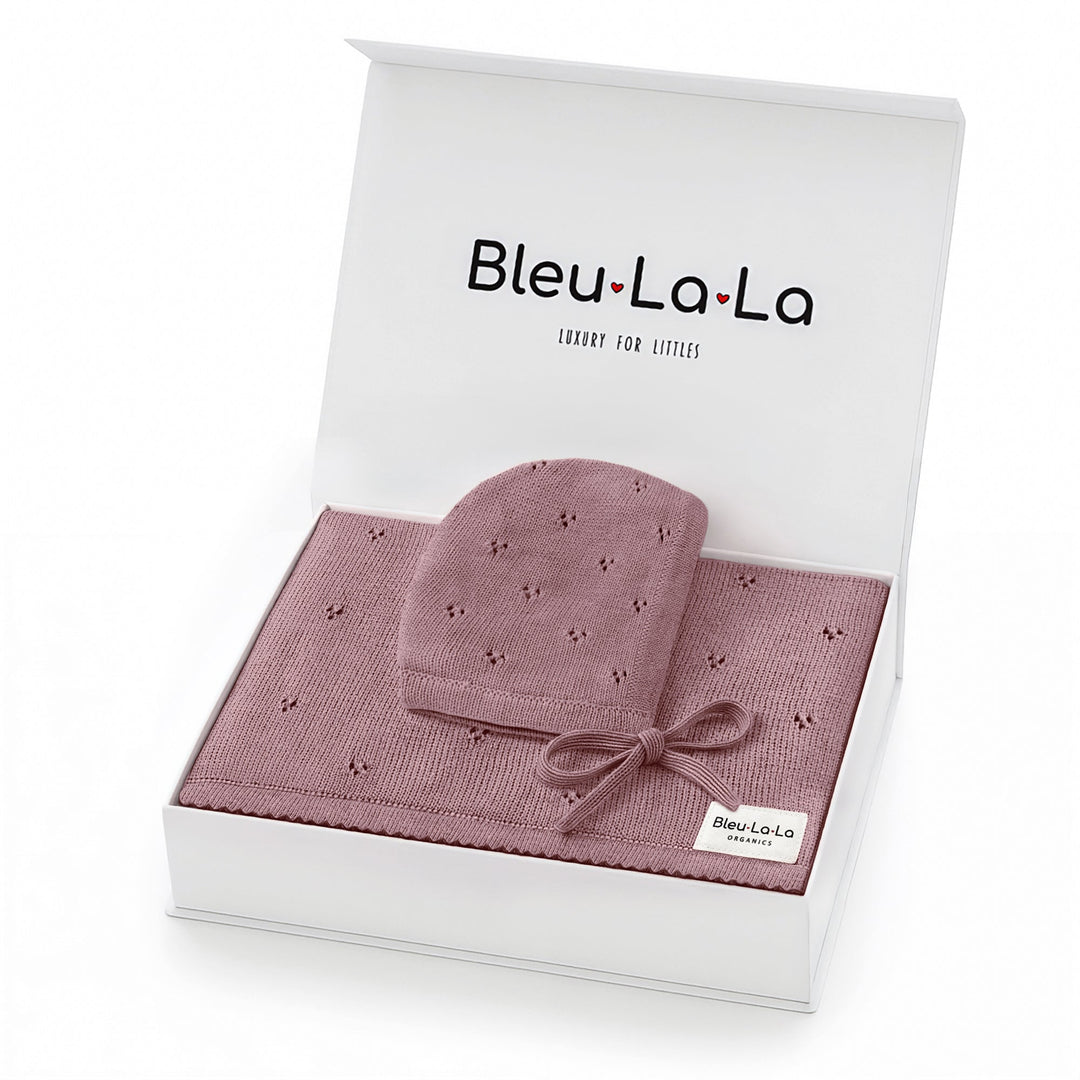 Bleu La La Organic Pointelle Swaddle Blanket + Hat Gift Set in sugar plum, neatly boxed to display pointelle knit texture.