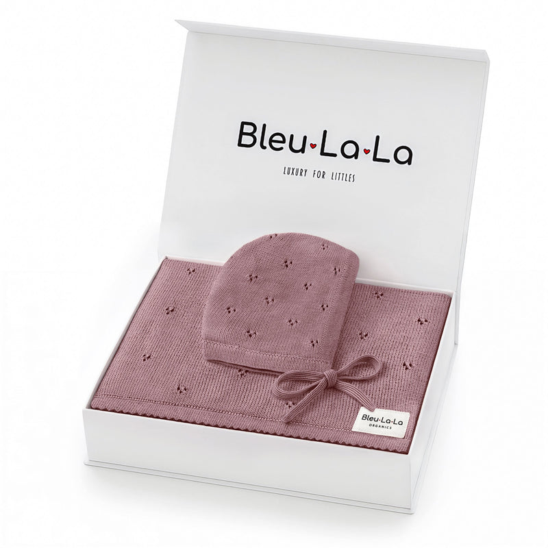 Bleu La La Organic Pointelle Swaddle Blanket + Hat Gift Set in sugar plum, neatly boxed to display pointelle knit texture.