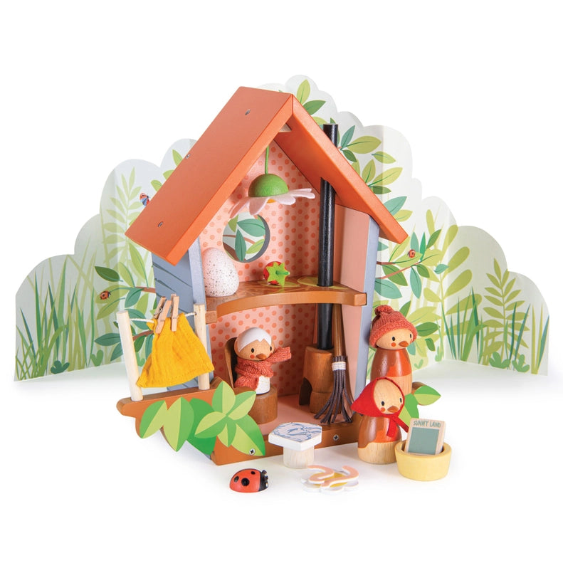 A cozy scene featuring the Tenderleaf RobinÕs Nest Box, crafted as delightful wood toys for little explorers.