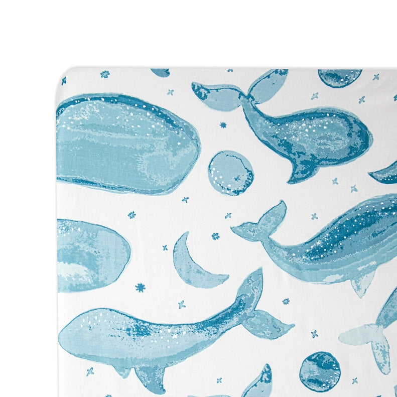 Stylish Crib Sheet in Whale from Crane Baby, ideal for nursery bedding.