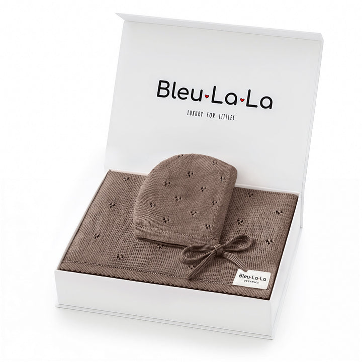 Bleu La La Organic Pointelle Swaddle Blanket + Hat Gift Set in mocha, folded to highlight breathable pointelle knit.