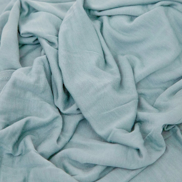 Wrap your baby in comfort with Little Unicorn Harbor Muslin Swaddle, perfect muslin blankets.