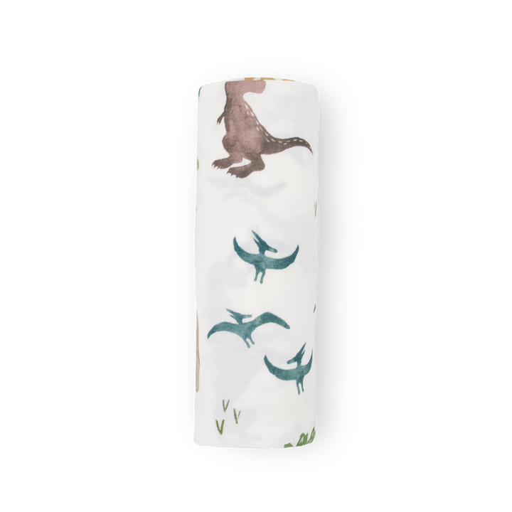 Soft muslin swaddle blankets from Little Unicorn, Stretch Knit Swaddle Blanket - Dino Pals for infant comfort