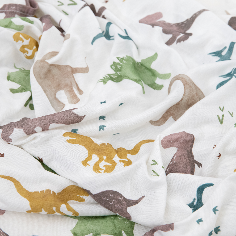 Dino Pals muslin swaddle by Little Unicorn, Stretch Knit Swaddle Blanket, perfect for cozy infant naps