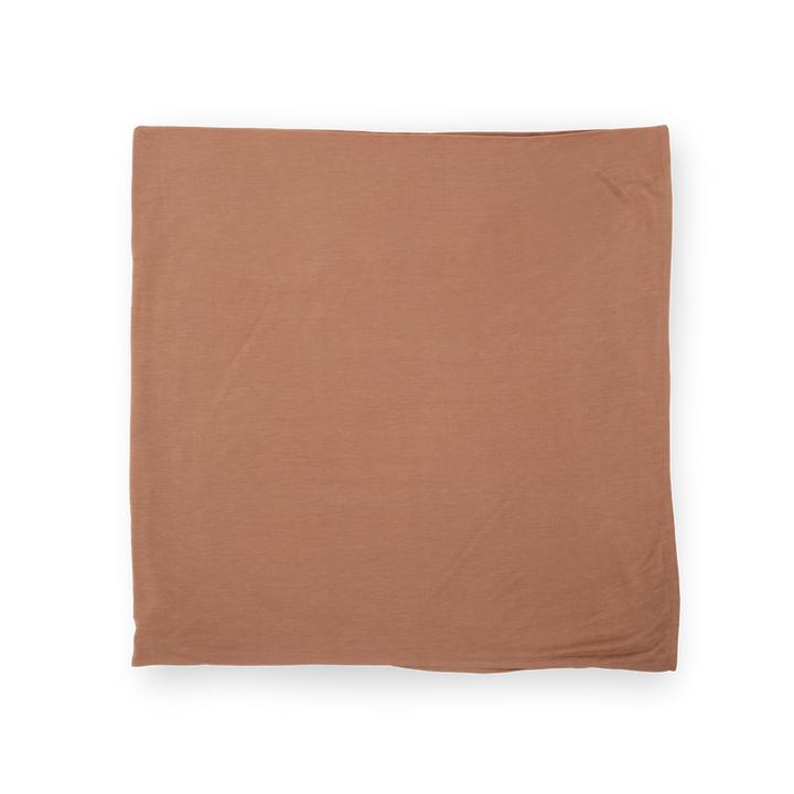 Gentle infant muslin blankets by Little Unicorn, Stretch Knit Swaddle Blanket in Terracotta.