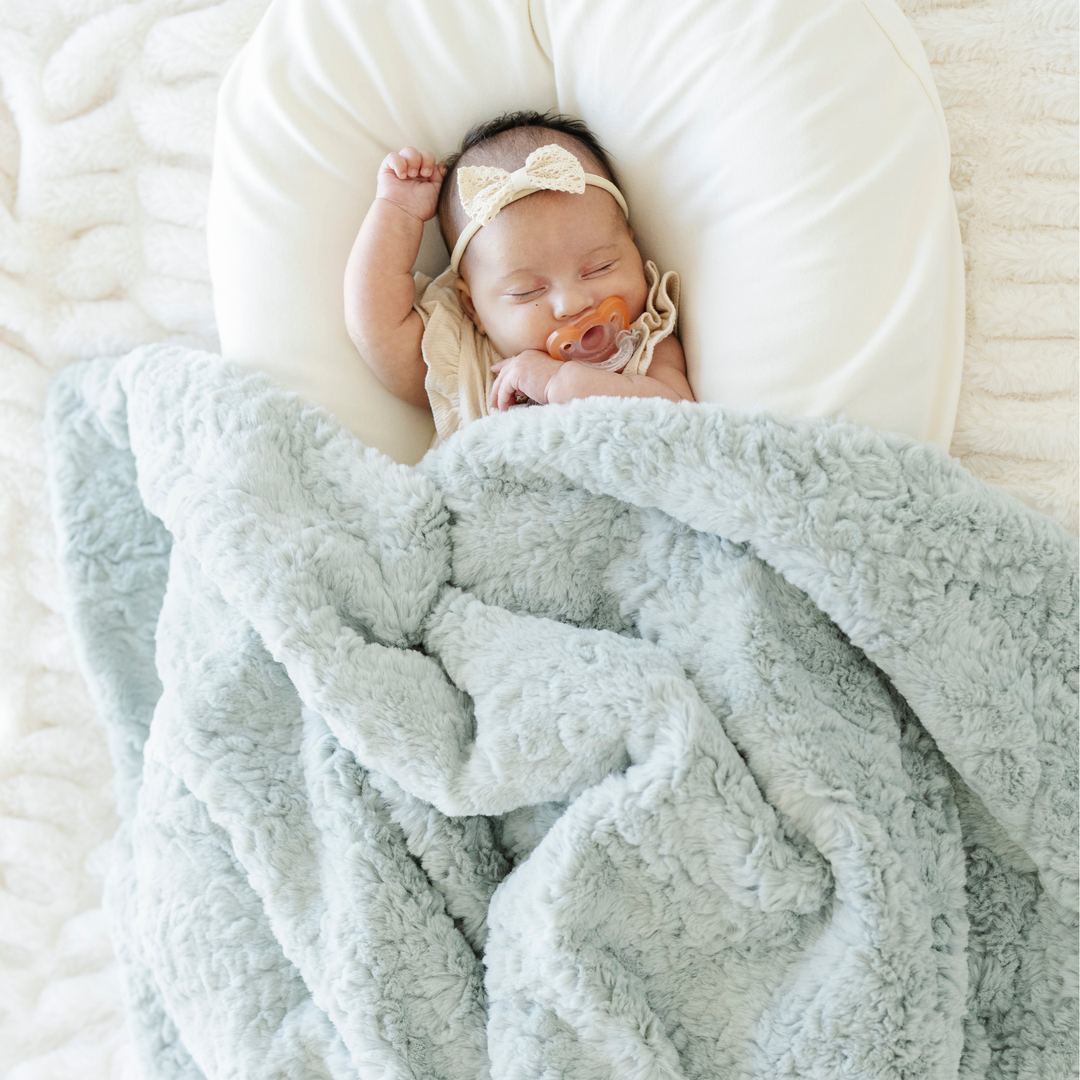 The Saranoni Dream Receiving Blanket in Sweet Mint is luxuriously soft, an ideal baby boy blanket for cuddles and calm.