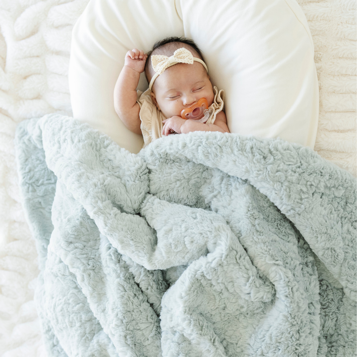 The Saranoni Dream Receiving Blanket in Sweet Mint is luxuriously soft, an ideal baby boy blanket for cuddles and calm.