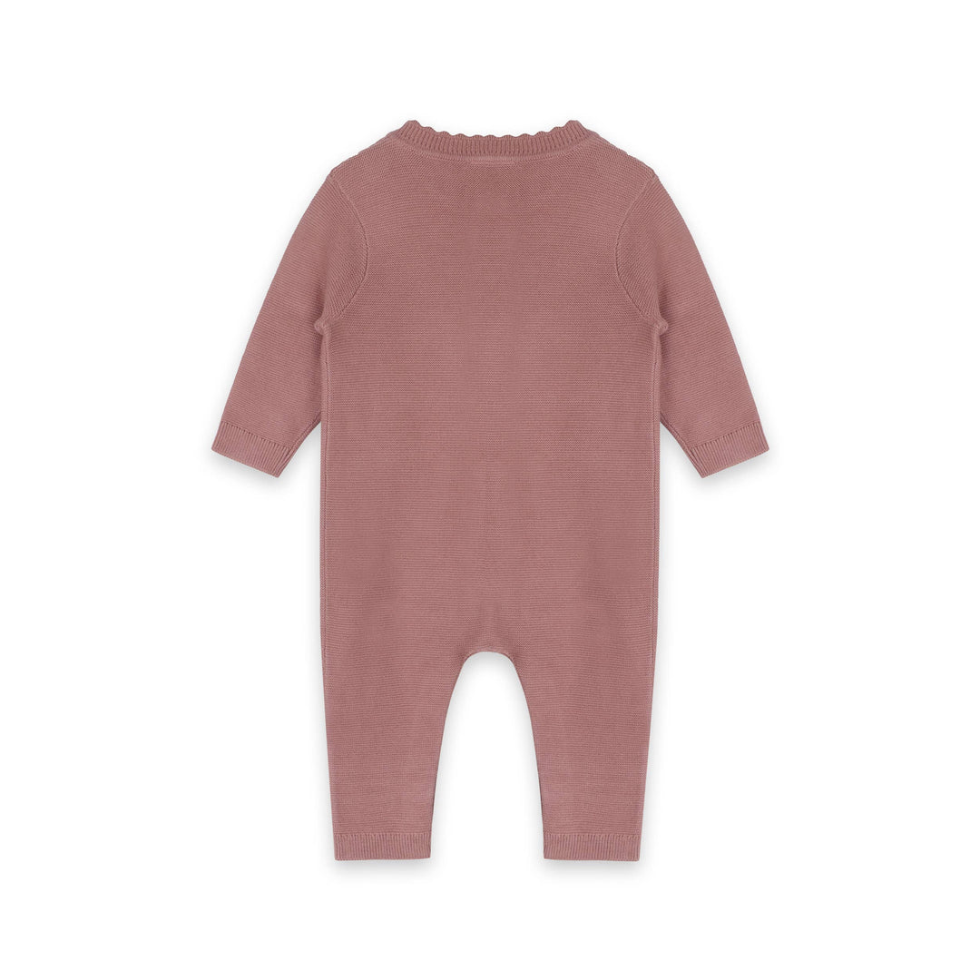 Backside of the Viverano Organics Vintage Rose Knitted Jumpsuit for infants with buttons and pockets