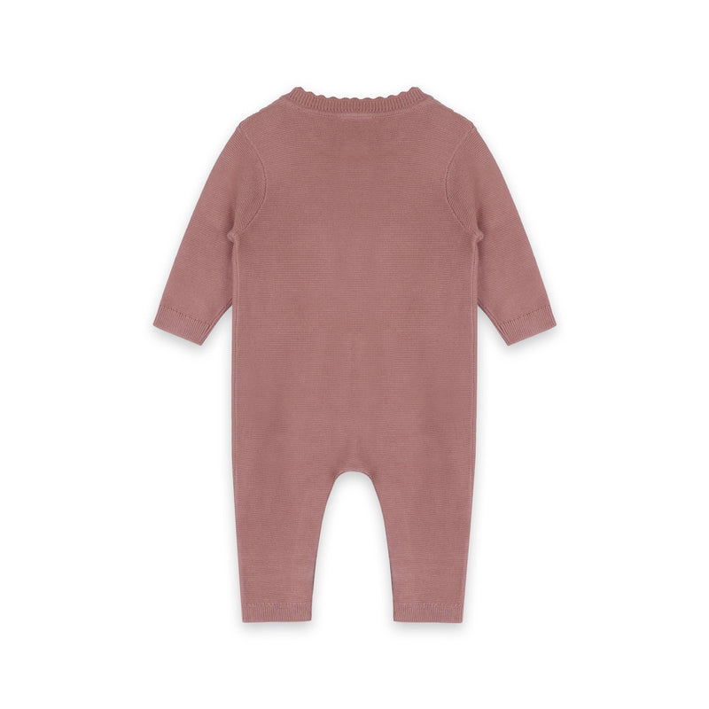 Backside of the Viverano Organics Vintage Rose Knitted Jumpsuit for infants with buttons and pockets