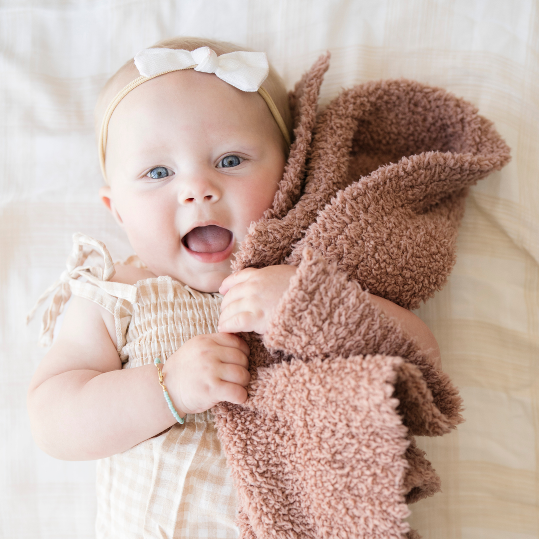 SaranoniÕs BAMBONI¨ Mini Blanket in Creamy French Rose is irresistibly soft, a lovely choice among baby girl blankets.
