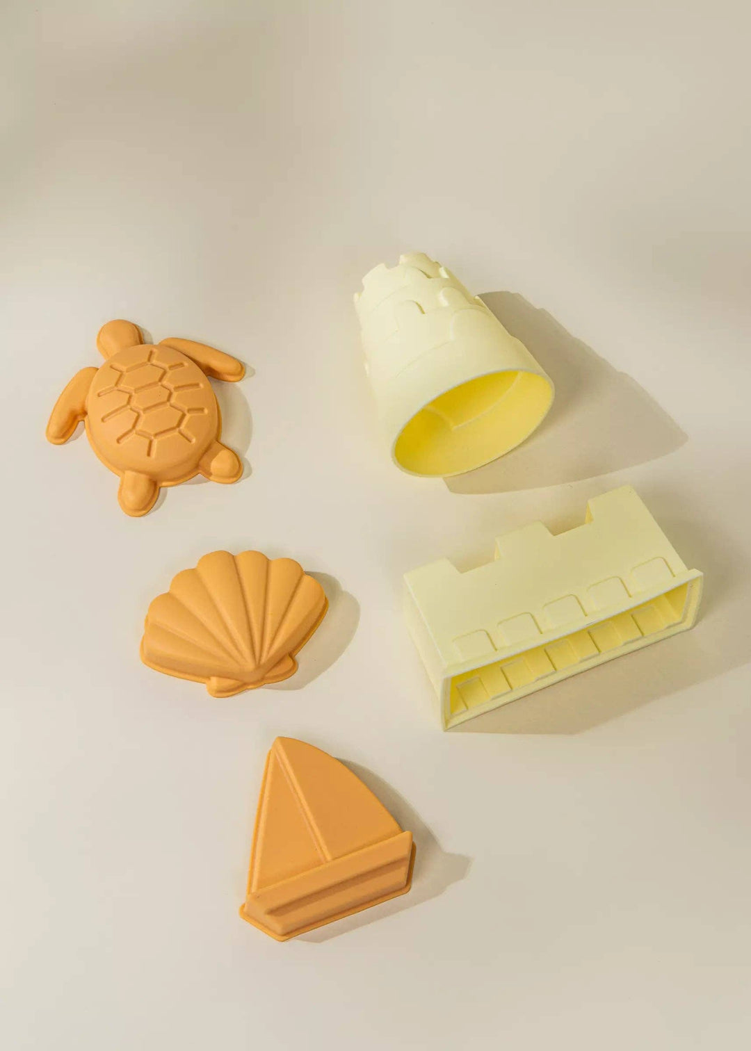 Bright and flexible, the Coco Village 5 Silicone Sand Moulds in Multicolor are perfect toddler toys for beach days.