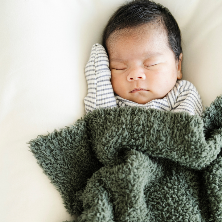 Bright and soft, the Saranoni BAMBONI¨ Mini Blanket in Juniper makes a charming baby blanket for snuggly moments.