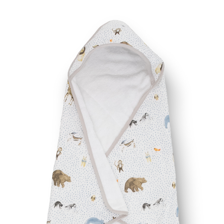 Absorbent baby hooded towel from Little Unicorn, Infant Hooded Towel - Party Animals, keeps babies comfy and cozy after bath