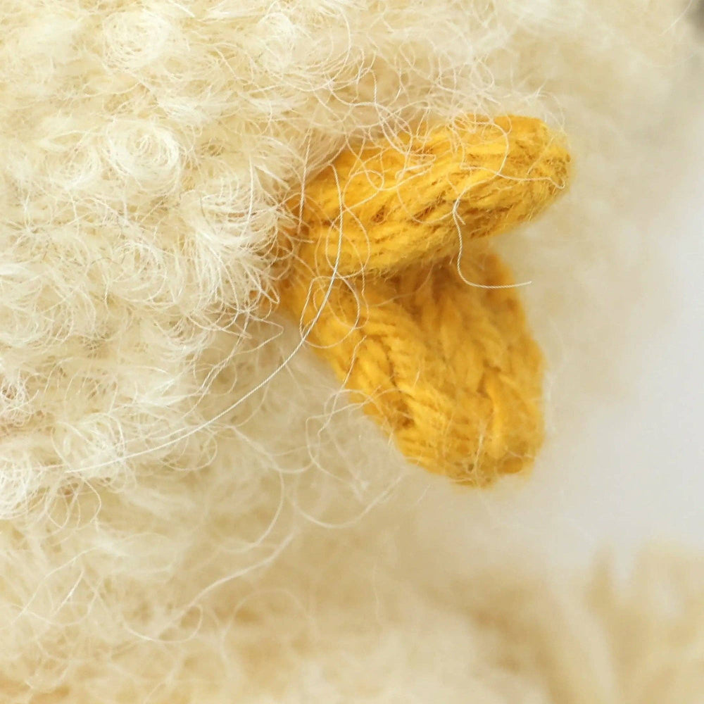 Baby Bouclé Chick Buttercup by Cuddle + Kind — collectible hand-knit yellow chick stuffed animal toy