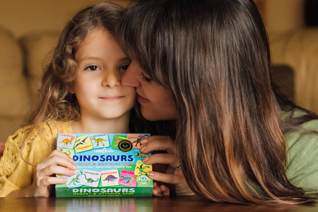 eeBoo Dinosaurs Memory Game tiles face-up showing Stegosaurus Allosaurus and more