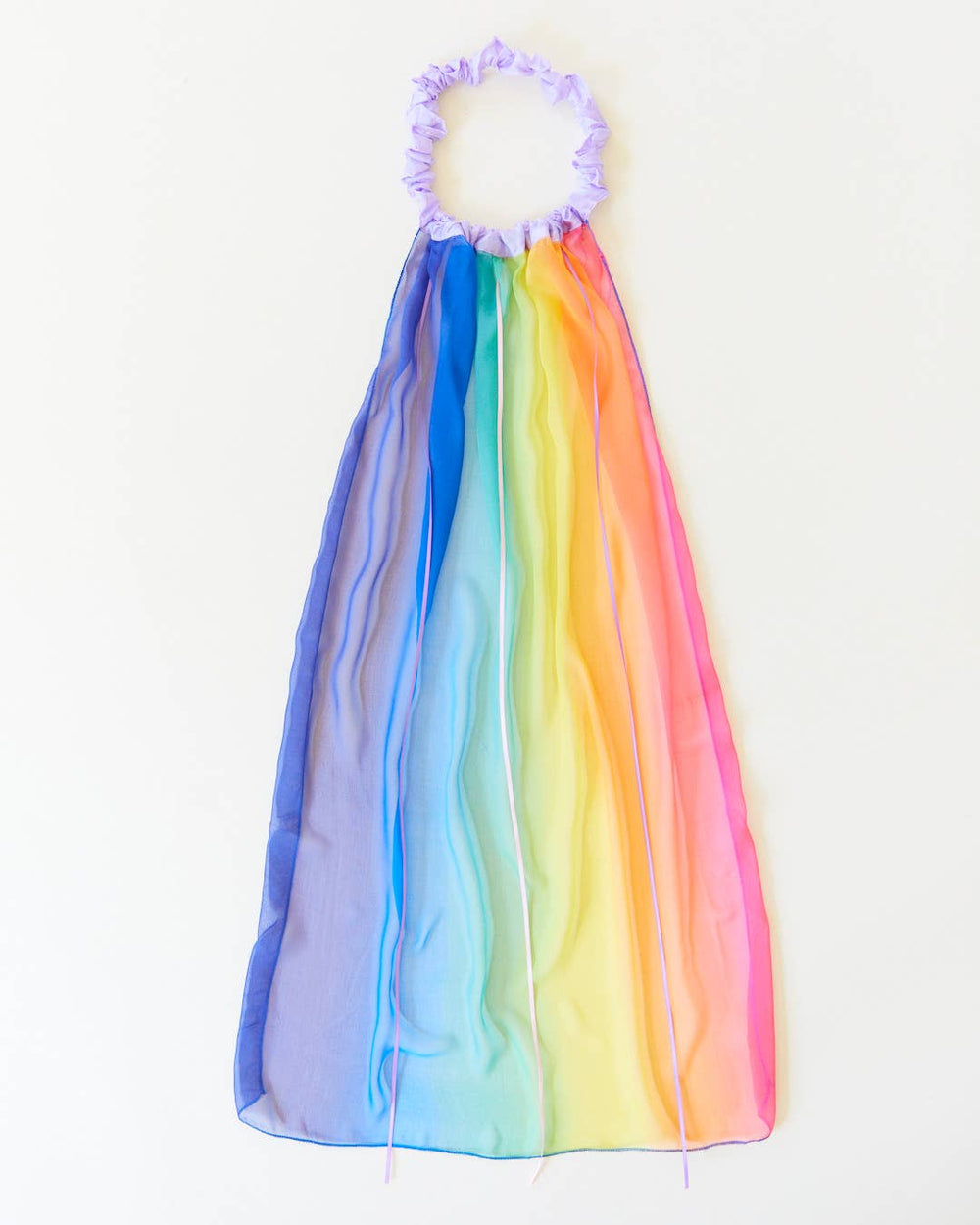 Full length flat lay of the Sarah's Silks Rainbow Veil, a favorite toy for imaginative play