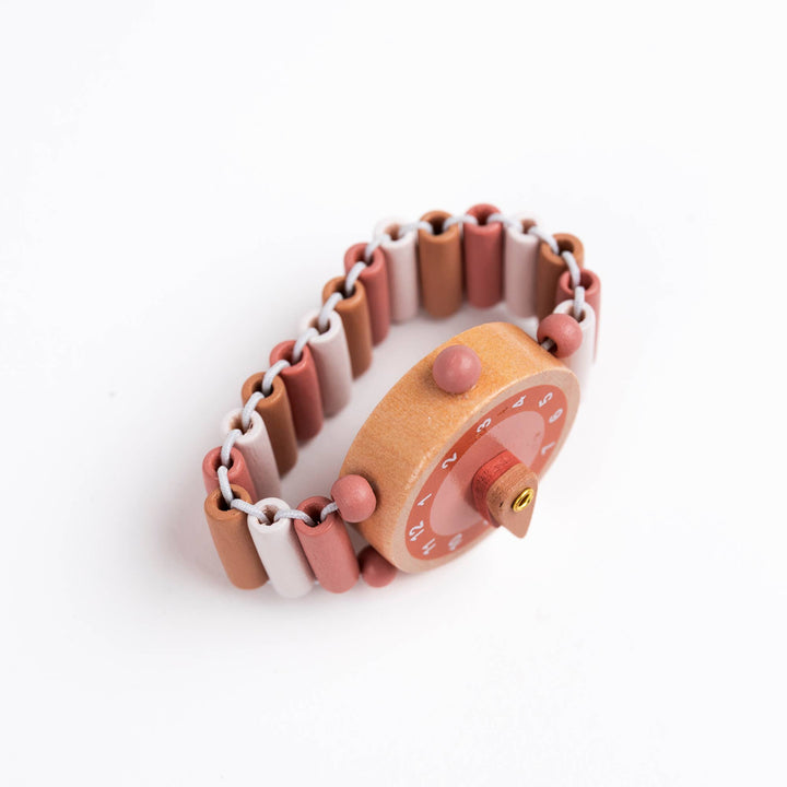 side view of egmont toys wooden play pretend watch emma in natural and pink color tones 