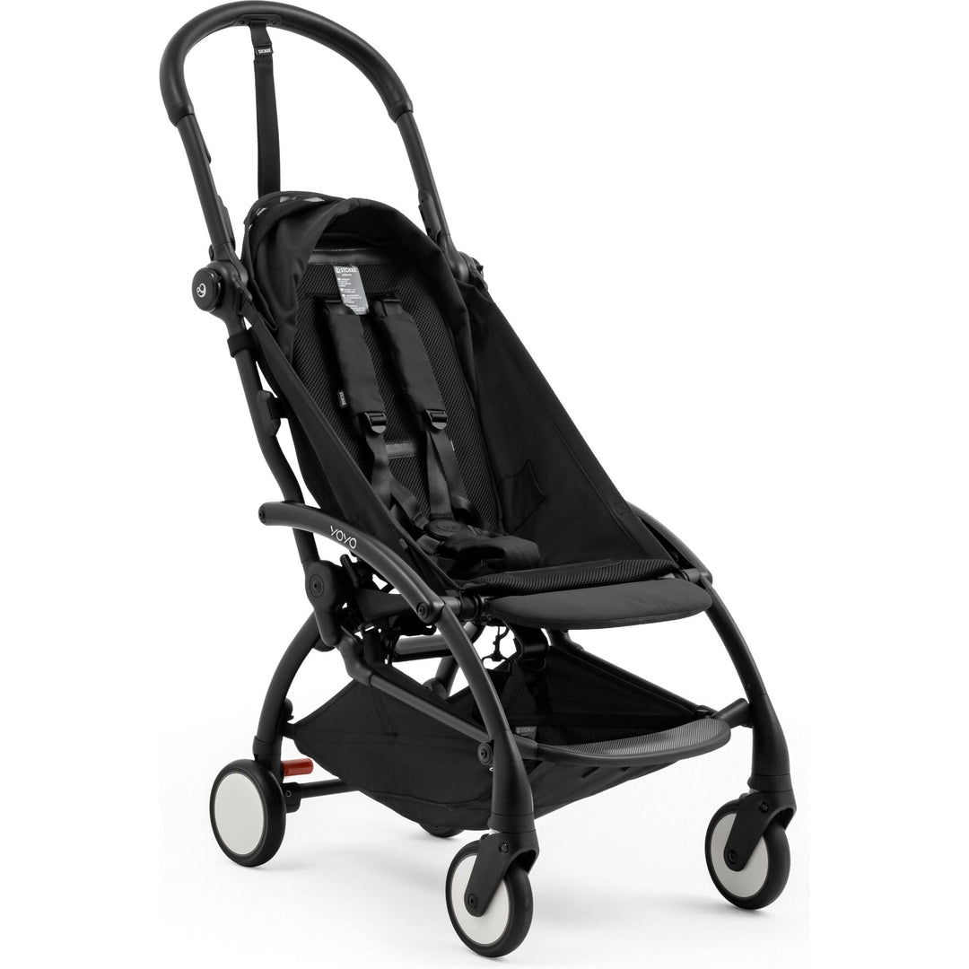 Black YOYO⁵ stroller base frame by Stokke, ultra-compact travel stroller