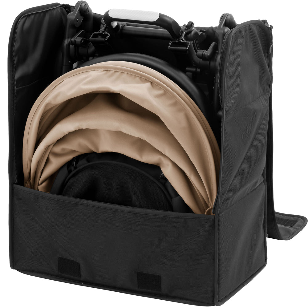 Black YOYO⁵ stroller backpack by Stokke with front pocket