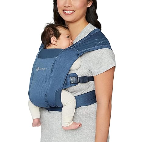 Versatile and sleek, the Ergobaby Embrace Newborn Carrier in Blue is a trusted baby front carrier for everyday comfort.