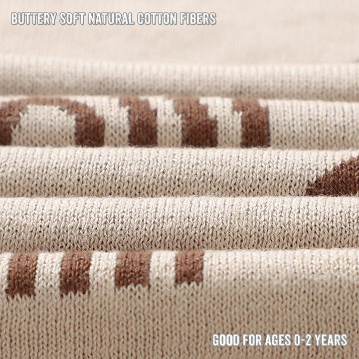 Closeup of the folded Bleu La La Rainbow Blanket in Taupe, advertising soft cotton and age ranges from newborn to two years old.