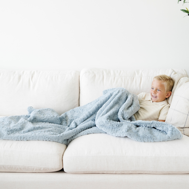 Saranoni Dream Toddler Blanket in Heather Blue feels warm and velvety smooth, easily ranking among the best toddler blankets.