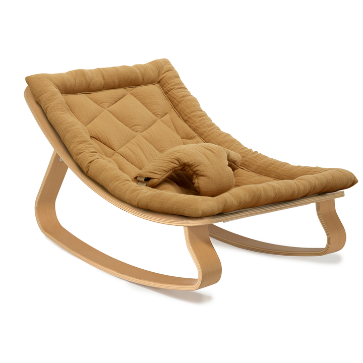Shown here in Camel, the Charlie Crane LEVO Rocker | Beech complements elevated nursery room furniture layouts