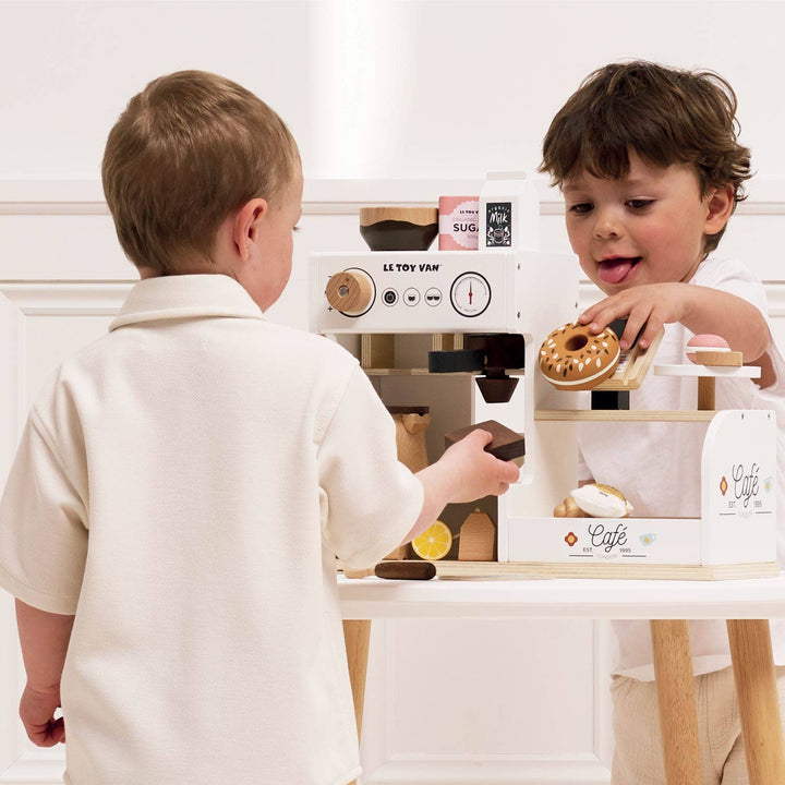Little baristas can explore creativity using the Le Toy Van Barista CafŽ Shop wood toys pretend coffee station
