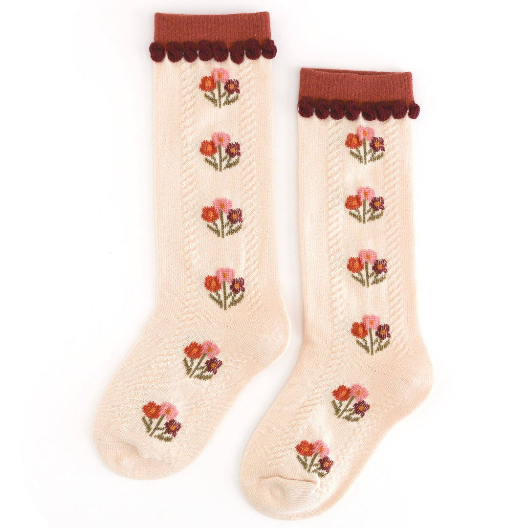 Little Stocking Co. Posie Knee Socks in Rust, floral knit knee-high socks with pom-pom trim for baby girls