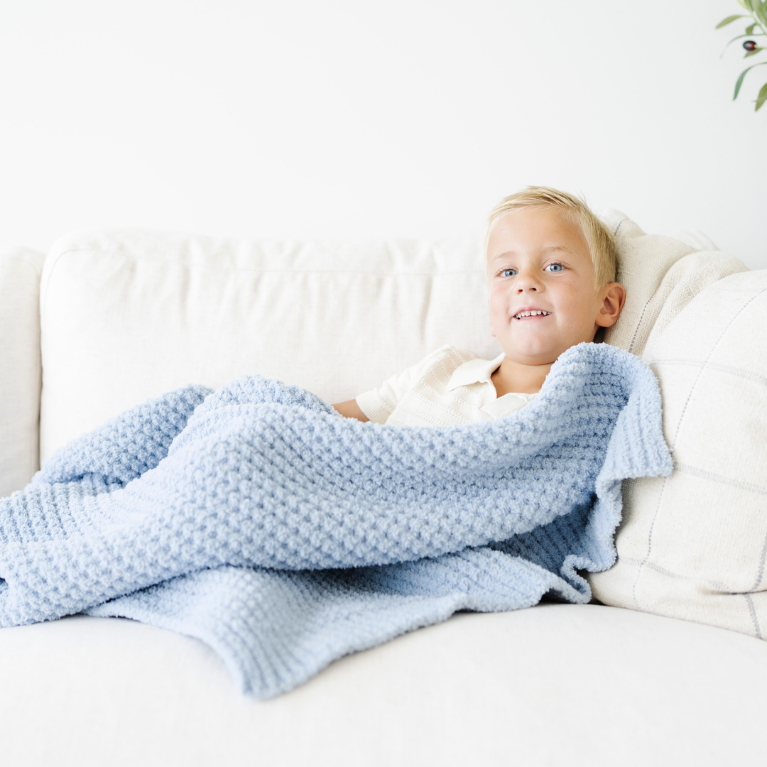 In Blue Jay, the Saranoni Waffle Knit Toddler Blanket offers breathable comfort, great as a best toddler blanket.