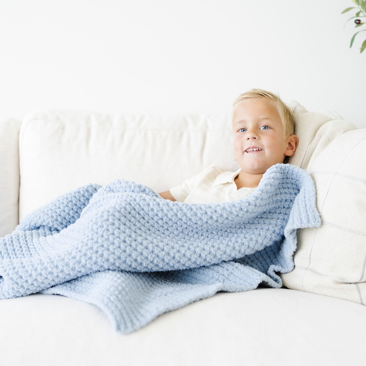 In Blue Jay, the Saranoni Waffle Knit Toddler Blanket offers breathable comfort, great as a best toddler blanket.